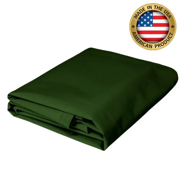 Green 12' x 16' 10oz vinyl tarp serving as industrial storage protection