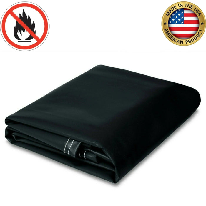 Black 8' x 12' 18oz flame retardant vinyl tarp featuring reinforced protective construction