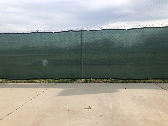 Green 8' x 50' 90% privacy fence mesh tarp enhancing landscape privacy protection