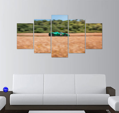 Emerald Green Ferrari Daytona SP3 Racing Past Golden Fields