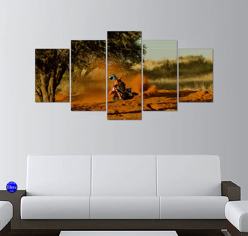 Motocross Rider Kicking Up Red Dust on a Desert Trail