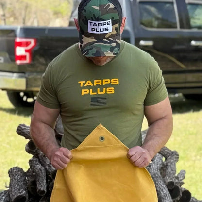 Tan 6' x 8' canvas tarp showcased during outdoor utility product demonstration