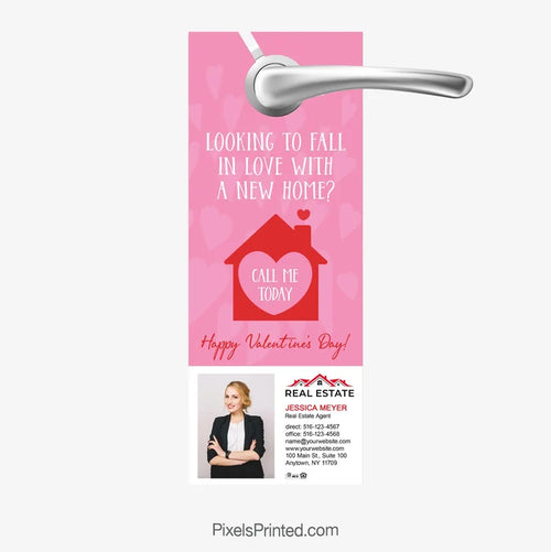 Valentine-themed real estate door hanger reading “Looking to fall in love with a new home?”