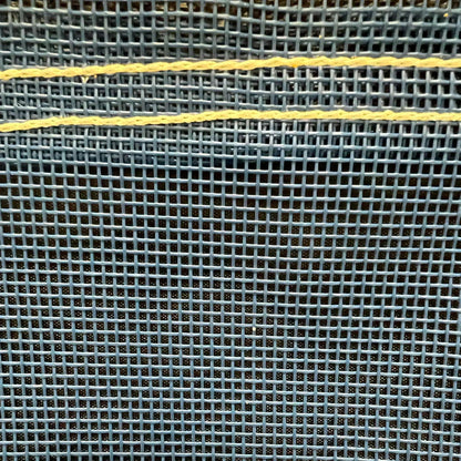 Blue 6' x 8' vinyl mesh tarp displaying breathable weave construction and edge support