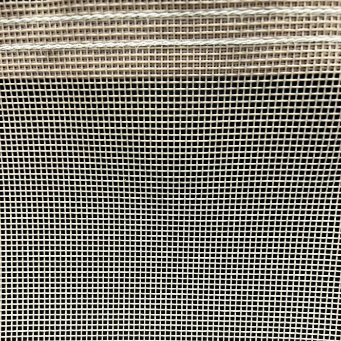 Tan 6' x 8' vinyl mesh tarp displaying coated weave construction and durable trim